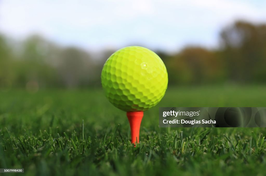 Close-up of golf Ball on a driving tee