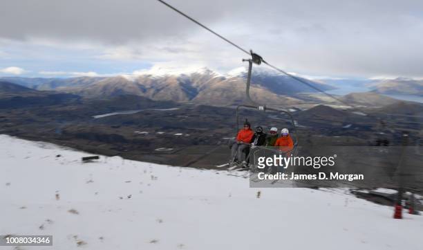 Group of morning skiers make their way up the Coronet Express chair lift at Coronet Peak on July 31, 2018 in Queenstown, New Zealand. Coronet Peak is...