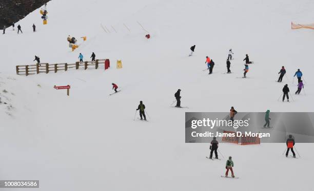 Skiers enjoy the morning snow at Coronet Peak on July 31, 2018 in Queenstown, New Zealand. Coronet Peak is a ski field In Queenstown, on the South...