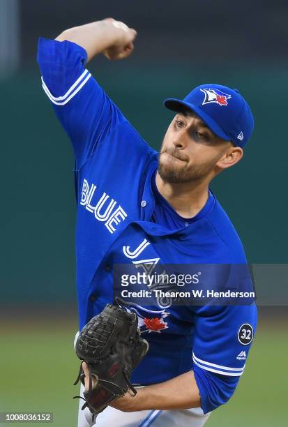Marco Estrada of the Toronto Blue Jays pitches against the Oakland Athletics in the bottom of the first inning at Oakland Alameda Coliseum on July...