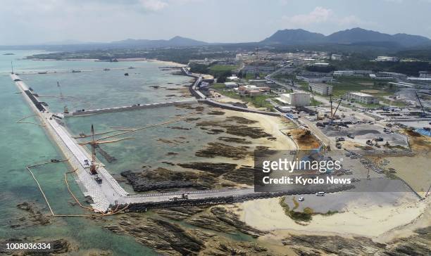 Photo taken July 27 from a drone shows an aerial view of the Henoko coastal area of Nago city in Okinawa Prefecture where seawall construction work...