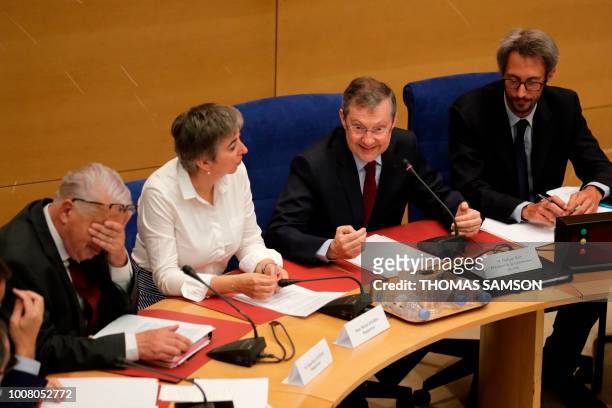 President of France's Senate Law Commission Philippe Bas speaks flanked by French Senator of the Loiret department Jean-Pierre Sueur and Senate Law...