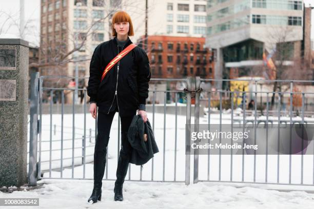 Model Ina Maribo Jensen wears all black and a bag with a lightning strap on Day 3 of New York Fashion Week Fall/Winter 2017 on February 11, 2017 in...