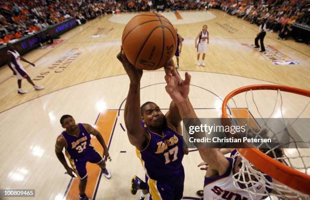 Andrew Bynum of the Los Angeles Lakers goes up for a dunk against the Phoenix Suns in the first half of Game Four of the Western Conference Finals...