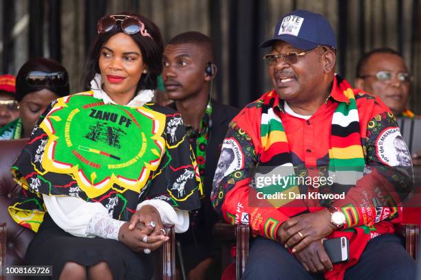 Wife of Former defence force commander General Constantino Chiwenga, Mary Chiwenga, and Home Affairs minister Obert Mpofu listen as Zimbabwe's...