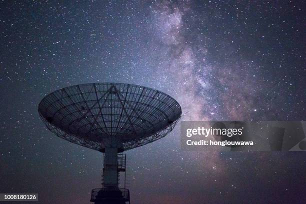 galaxy and radio telescope - audio receiver stock pictures, royalty-free photos & images