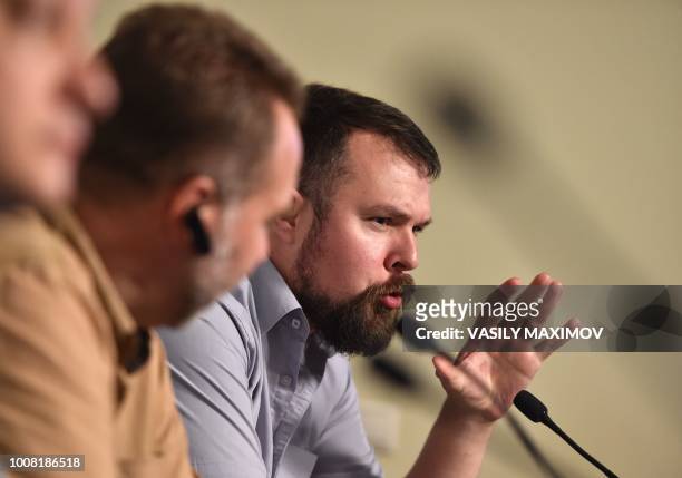 Tim Kirby, a US journalist at the Moscow's state-funded international broadcaster RT, and member of the National Rifle Association, addresses a press...