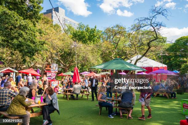 relaxing between shows at the edinburgh festival - edinburgh festival stock pictures, royalty-free photos & images