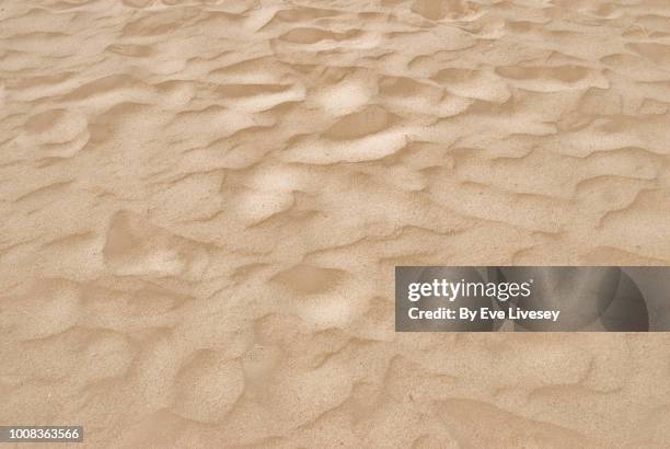 sand texture - sand fotografías e imágenes de stock