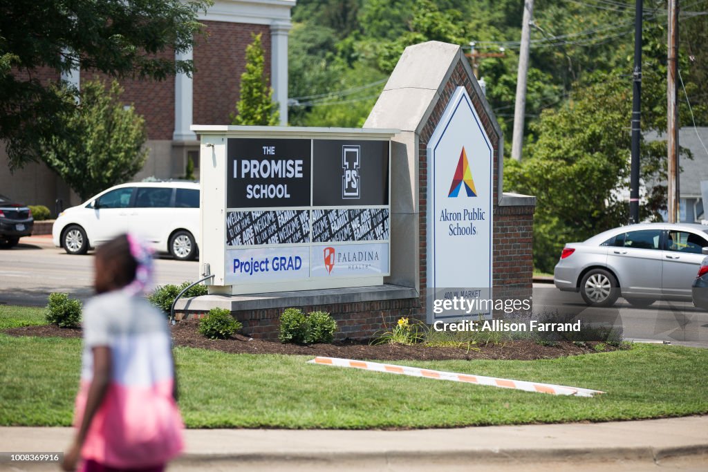 New school signage is seen at the grand opening of the I Promise