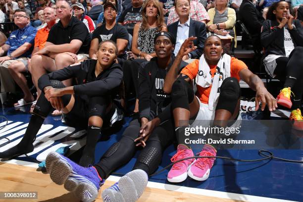 Seimone Augustus, Sylvia Fowles and Rebekkah Brunson of Team Delle Donne look on with Rebekkah Brunson of Team Parker during the Three-Point Contest...