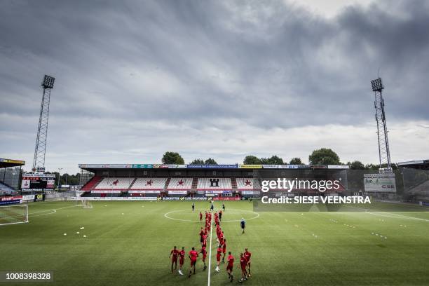 Emmen's players take part in a training session at the the Stadium De Oude Meerdijk, the club's home stadium, on July 31 in Emmen. - FC Emmen will...