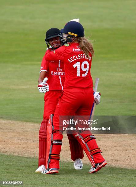 Harmanpreet Kaur and Sophie Ecclestone of Lancashire celebrate scoring the winning runs during the Kia Super League match between Surrey Stars and...