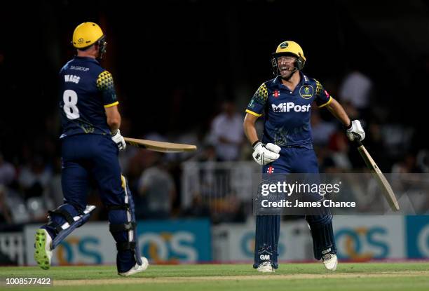 Graham Wagg of Glamorgan celebrates victory with Andrew Salter of Glamorgan after the Vitality Blast match between Surrey and Glamorgan at The Kia...