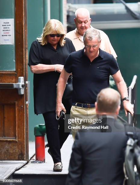 Scott Kingsley Swift and Andrea Swift are seen walking in Tribeca on July 31, 2018 in New York City.