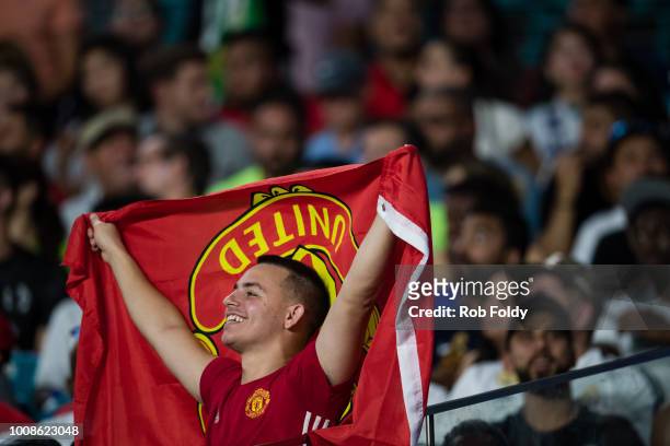 Manchester United fan cheers during the International Champions Cup match against the Real Madrid at Hard Rock Stadium on July 31, 2018 in Miami,...