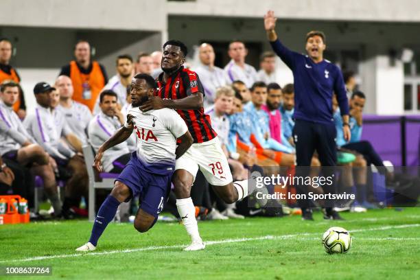 Milan midfielder Franck Kessie , right, collides with Tottenham Hotspur midfielder Georges-Kévin Nkoudou during the International Champions Cup match...