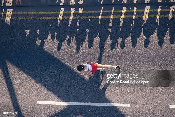 aerial view of runners - marathon stock-fotos und bilder