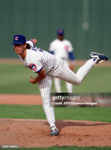 Mitch Williams of the Chicago Cubs pitching during a game from his 1991 season with the Chicago Cubs. Mitch Williams played for 11 seasons with 6...