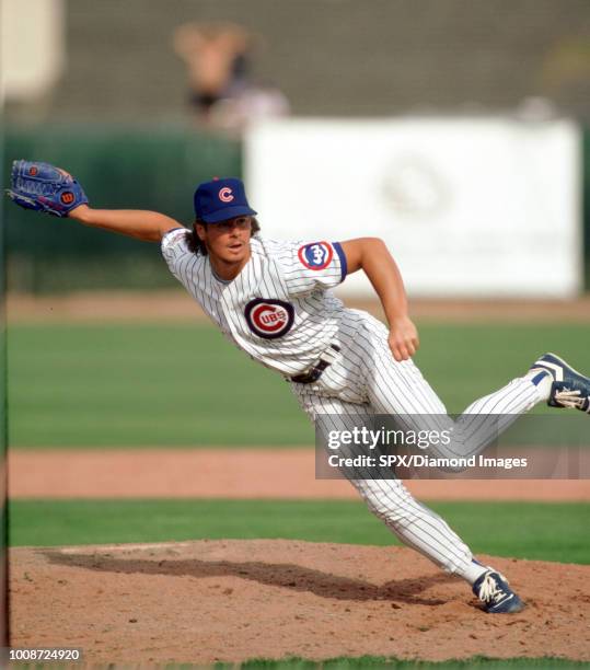 Mitch Williams of the Chicago Cubs pitching during a game from his 1991 season with the Chicago Cubs. Mitch Williams played for 11 seasons with 6...