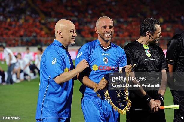 Enrico Ruggeri and Eros Ramazzotti of Nazionale Cantanti attend the XIX Partita Del Cuore charity football game at on May 25, 2010 in Modena, Italy.