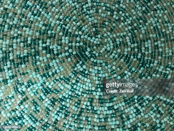 part of a circular placemat made of plastic beads - beads stock pictures, royalty-free photos & images