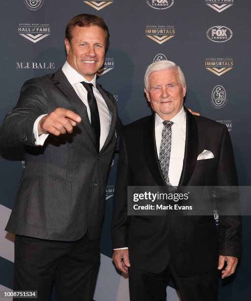 Andrew Ettingshausen and his father John pose for photos as they arrive at the 2018 NRL Hall of Fame at Sydney Cricket Ground on August 1, 2018 in...
