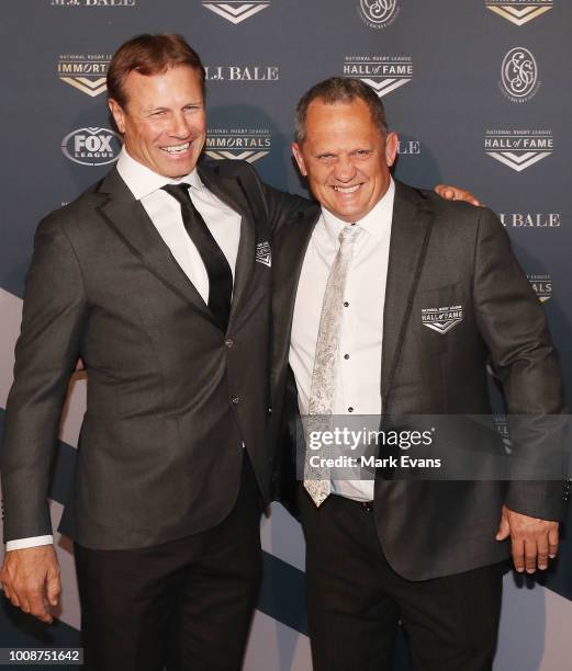 Andrew Ettingshausen and Steve Walters pose for photos as they arrive at the 2018 NRL Hall of Fame at Sydney Cricket Ground on August 1, 2018 in...
