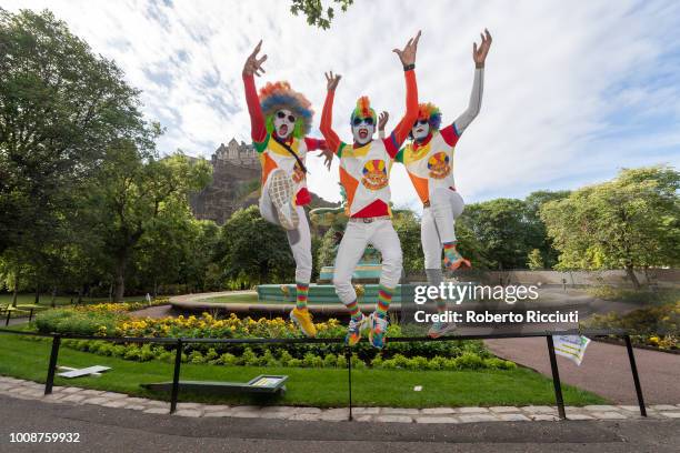 Performers from Fresh the Clownsss, America's biggest circus, jump during a photocall to promote their show 'Universoul: Hip Hop Under the Big Top'...