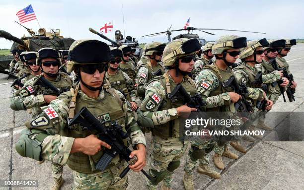 Servicemen take part in the joint multinational military exercise "Noble Partner 2018" at Vaziani training centre, outside Tbilisi, on August 1,...