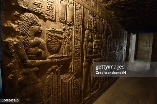 corridor of the ancient egyptian temple of dendera - ancient egyptian stock pictures, royalty-free photos & images