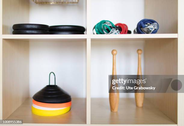 May 25: Shelf with sports equipment in a physiotherapy practice on May 25, 2018 in BONN, GERMANY.