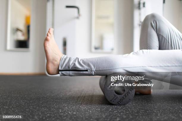 May 25: Fascia training in a physiotherapy practice on May 25, 2018 in BONN, GERMANY. Balance training on a trampoline.