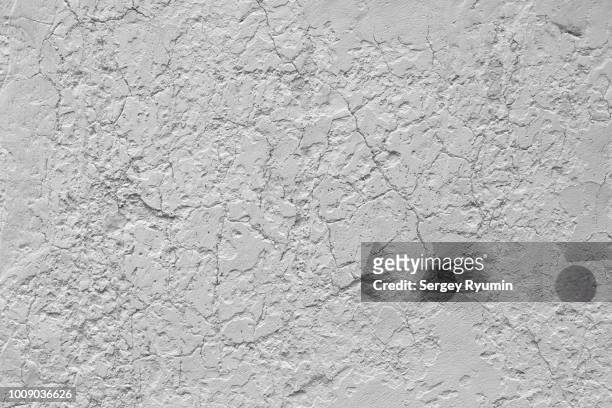 white weathered wall texture - cracked plaster stock pictures, royalty-free photos & images
