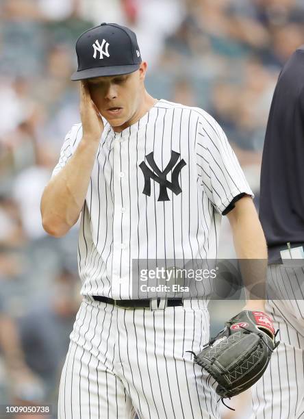 Sonny Gray of the New York Yankees reacts as he is pulled from the game in the third inning against the Baltimore Orioles at Yankee Stadium on August...