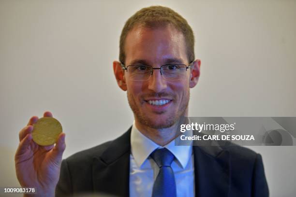 Italian mathematician Alessio Figalli, one of four winners of mathematics' prestigious Fields medal, often known as the Nobel prize for maths, poses...