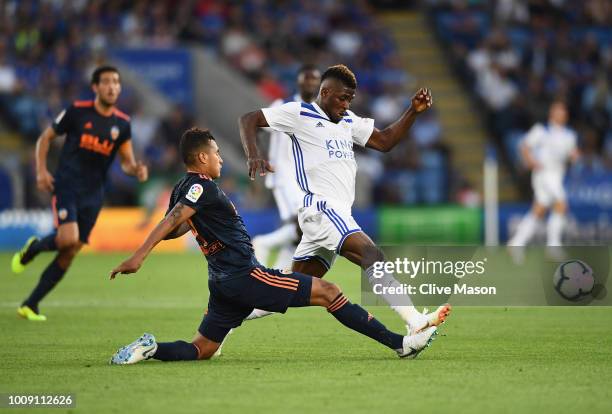 Kelechi Iheanacho of Leiceter City is challenged by Jeison Murillo of Valencia during the pre-season friendly match between Leicester City and...