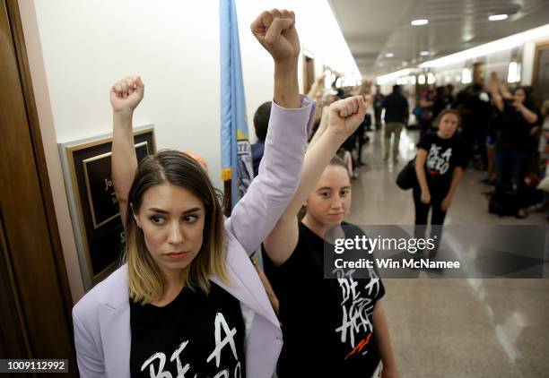 Protesters opposed to the nomination of Supreme Court nominee Judge Brett Kavanaugh gather outside the office of Sen. John Thune prior to a scheduled...