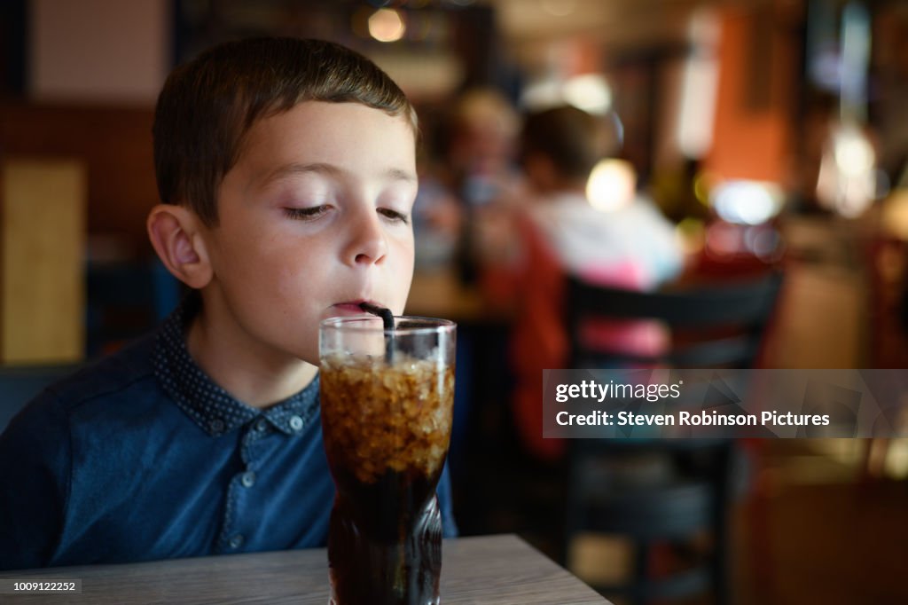 Boy Drinking Sugary Drink
