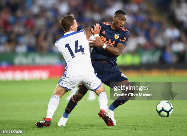 Adrien Silva of Leicester City challenges Geoffrey Kondogbia of Valencia during the pre-season friendly match between Leicester City and Valencia at...