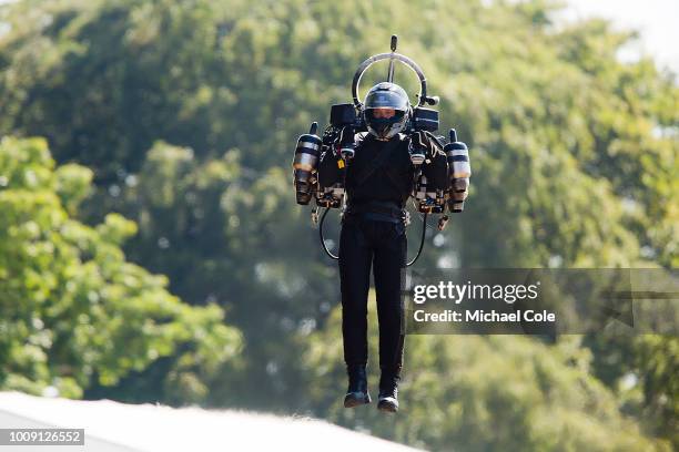 14th July: David Mayman, , flies up the Goodwood Hill displaying his JB11 JetPack at Goodwood on July 14, 2018 in Chichester, England.