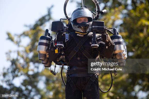 14th July: David Mayman, , flies up the Goodwood Hill displaying his JB11 JetPack at Goodwood on July 14, 2018 in Chichester, England.