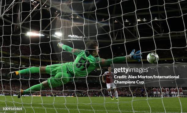 Mesut Ozil of Arsenal scores from the penalty spot during the penalty shoot out during the International Champions Cup 2018 match between Arsenal and...