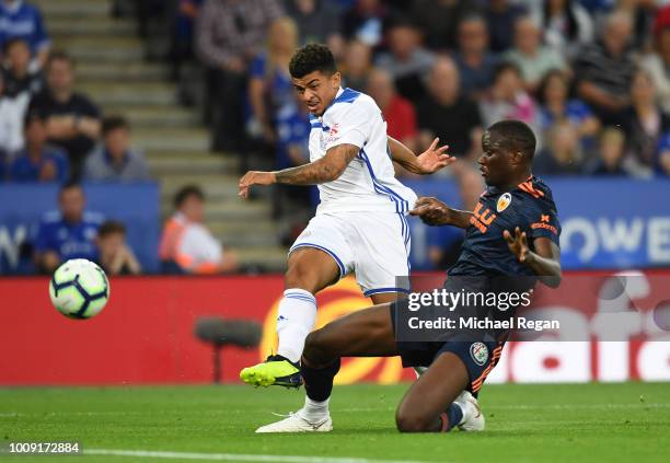 Josh Gordon of Leicester shoots past Mouctar Diakhaby of Valencia during the pre-season friendly match between Leicester City and Valencia at The...