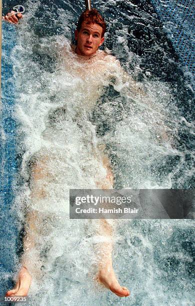 Australian Socceroo Hayden Foxe relaxes in the spa, during a training session in the Crown Towers pool, in the lead up to the match between Australia...