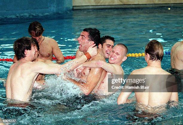 The Australian Socceroos enjoy themselves, during a training session in the Crown Towers pool, in the lead up to the match between Australia and...