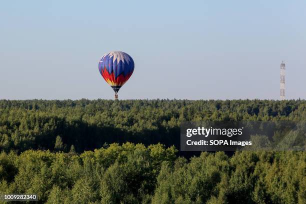 Aeronautics balloon seen above the forest. The Aeronautics championship takes place in the Nizhny Novgorod region. 14 teams from Russia and Germany...