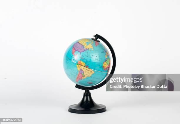 globe showing america - world globe stock-fotos und bilder