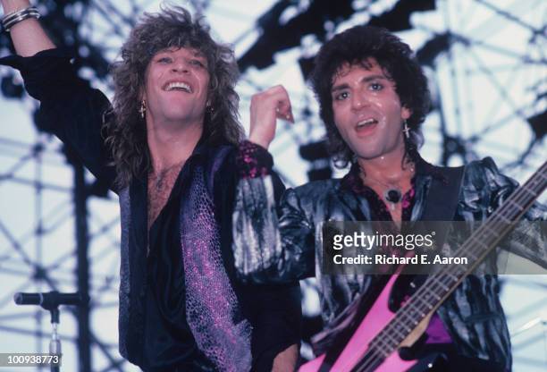 Singer Jon Bon Jovi and bassist Alec John Such of Bon Jovi perform on stage circa 1987.