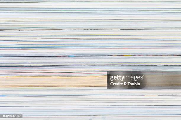 close-ups of stack of colorful magazines - publications - news article stock pictures, royalty-free photos & images